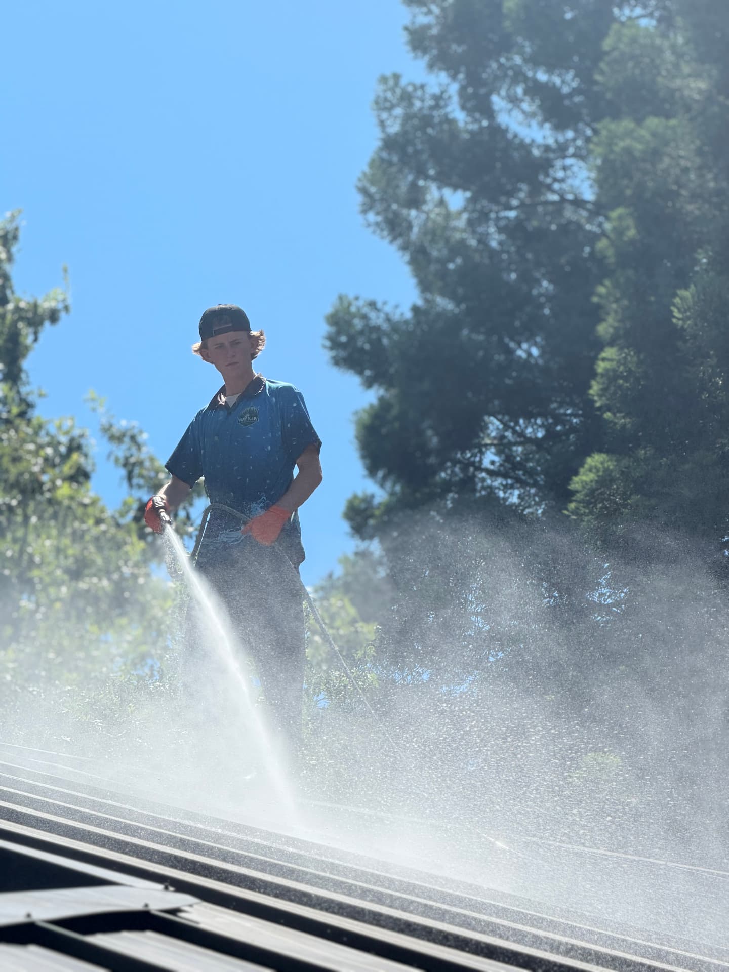 Roof washing in progress